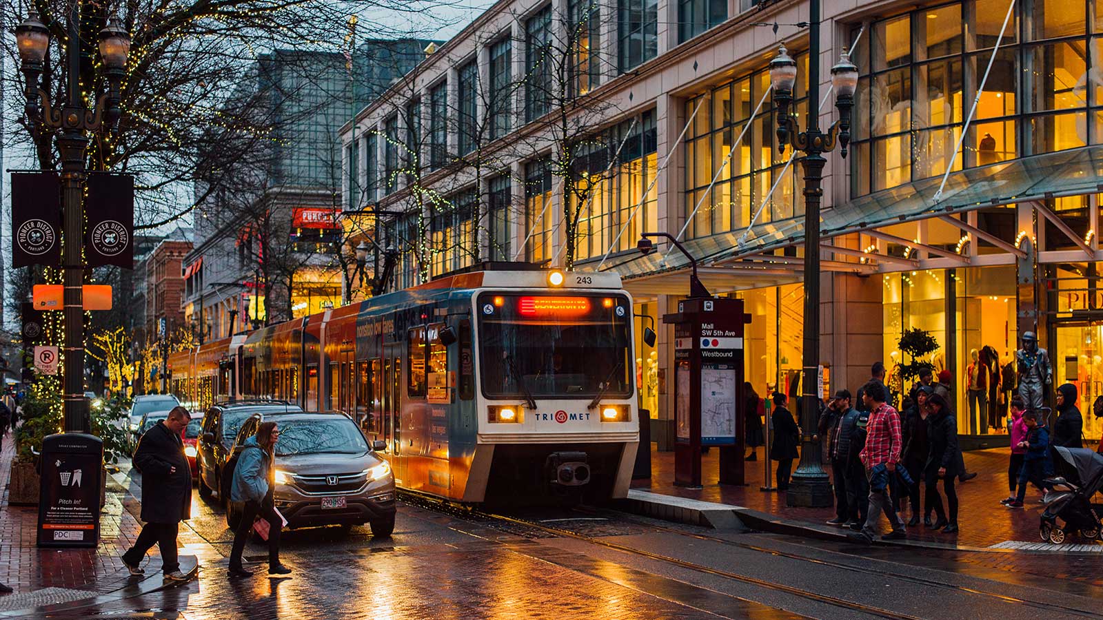 MAX Light Rail train in downtown Portland on a rainy night