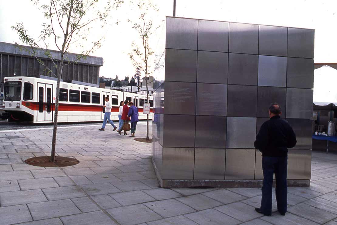 A square systems building made of metal cubes