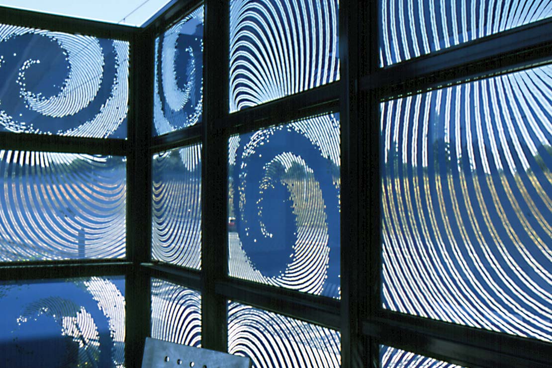 Windscreens with etched blue glass spirals