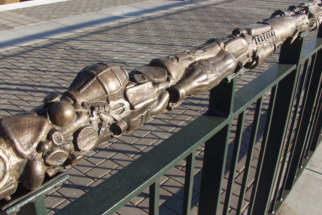 Railing - cast metal sculpture with found objects