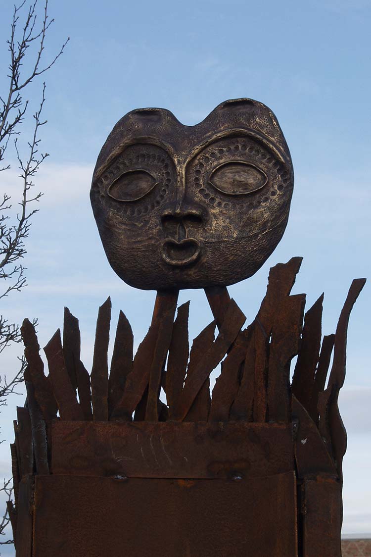 Bear Woman Chief - metal sculpted mask on tall metalic base